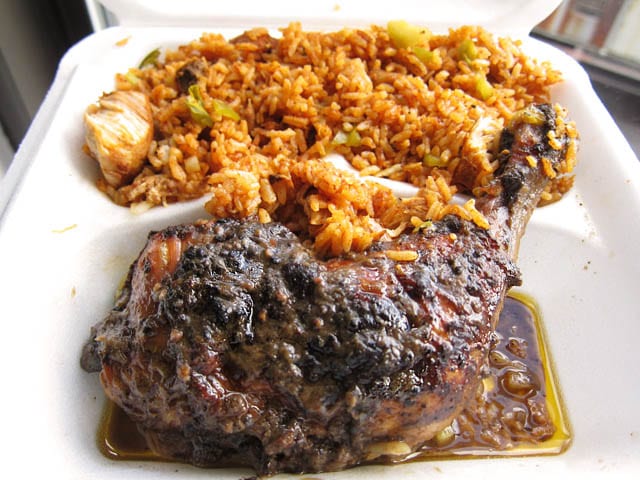 Typical Jamaican jerk chicken with rice and peas