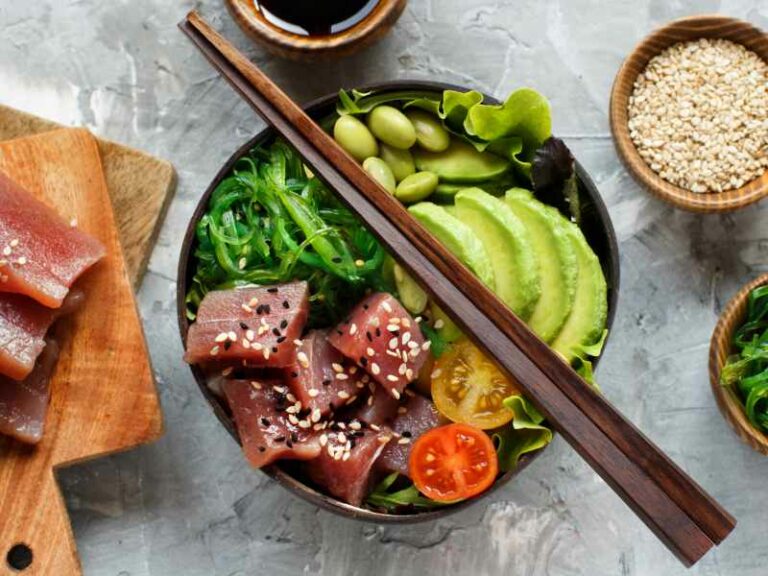 Tuna ahi poke bowl with chopsticks on top