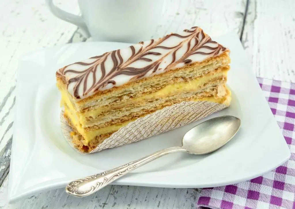 Mille Feuille on plate with spoon