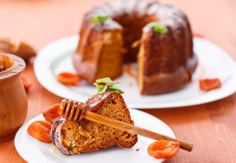 German Lekach Cake with honey stick