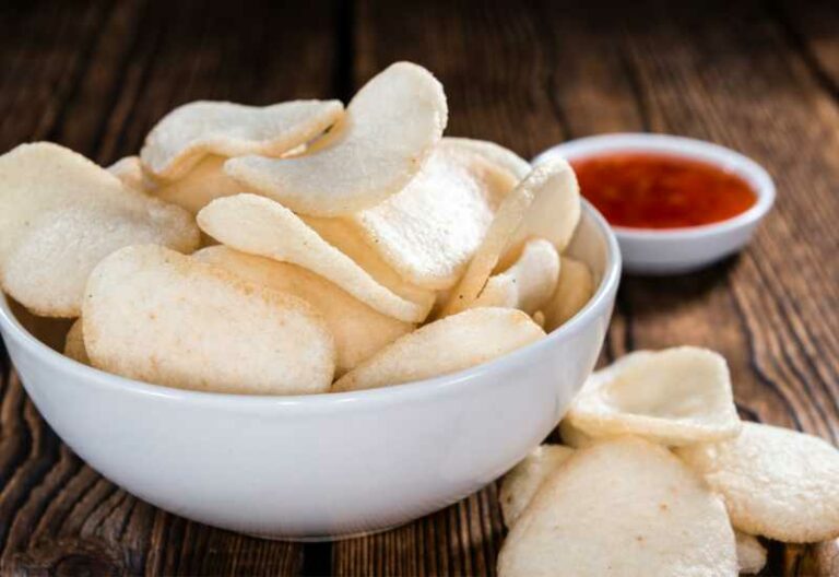 Shrimp chips prawn crackers in bowl with dipping sauce