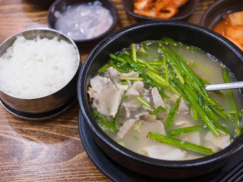 Dwaeji Gukbap served with white rice on the side.