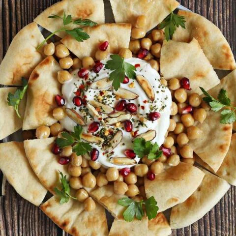 Fatteh with pomegranate seeds.