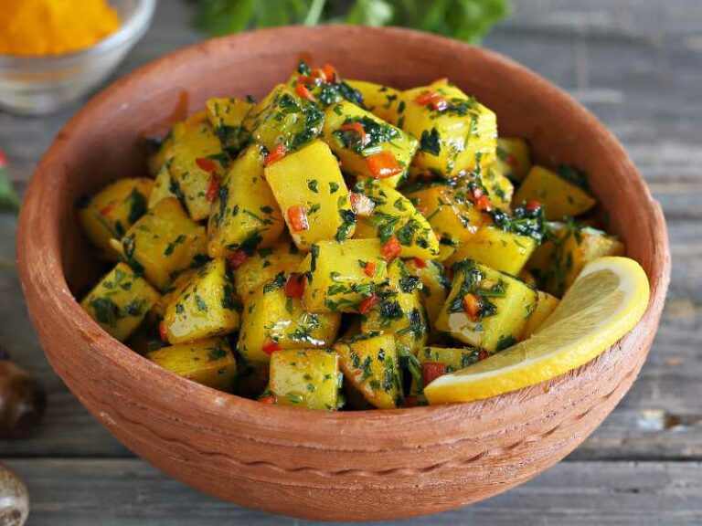 Batata Harra served with lemon