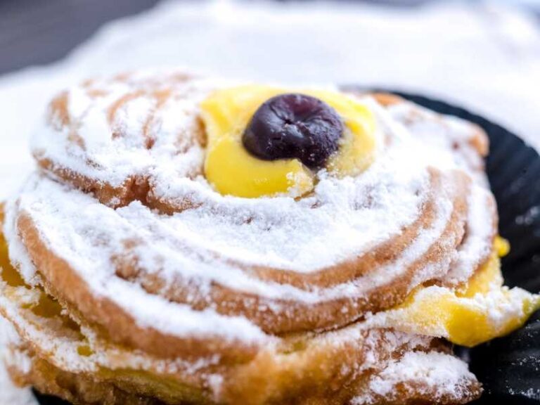 Zeppole di San Giuseppe with black cherries