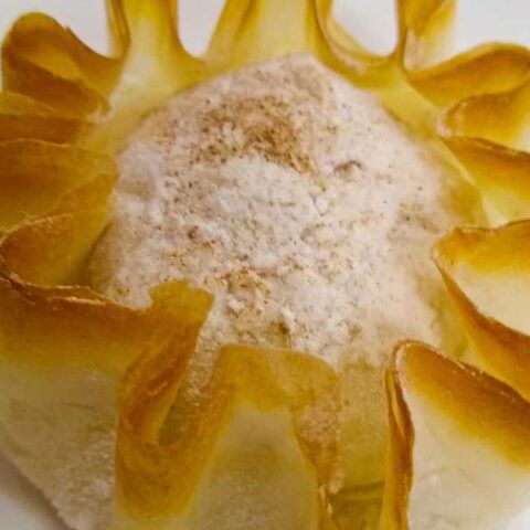 Pastel de Santa Clara in frilly shell.
