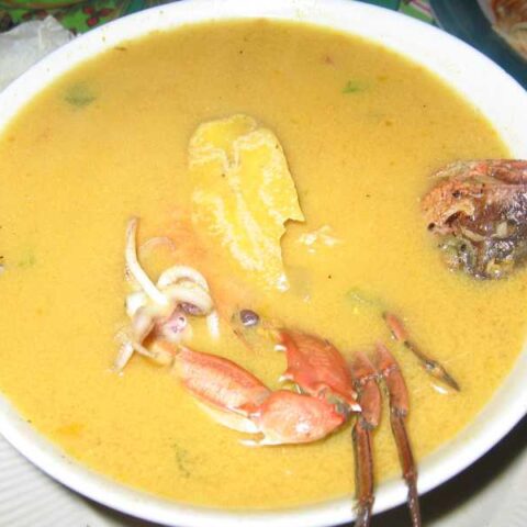 Tapado with whole fish and crab.