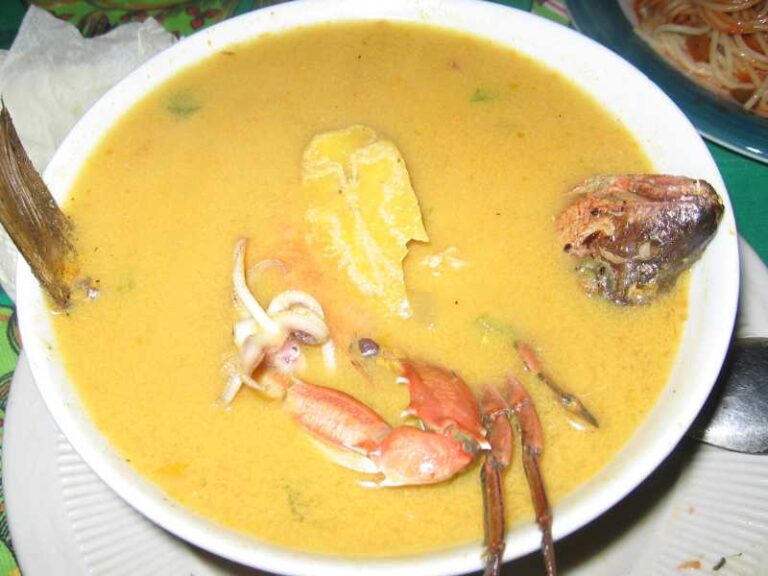 Tapado with whole fish and crab.