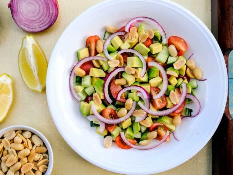 Salad with avocado, lemon, peanuts.